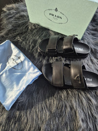 DAMES SLIPPER Prada Leather Sandals With Triangle Logo