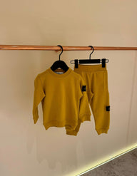 KIDS Trainingspak stone Island Basic Mosterdgeel
