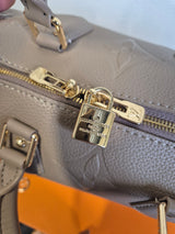DAMES TASSEN Luis Vuitton Speedy Bandoulière 25 Beige