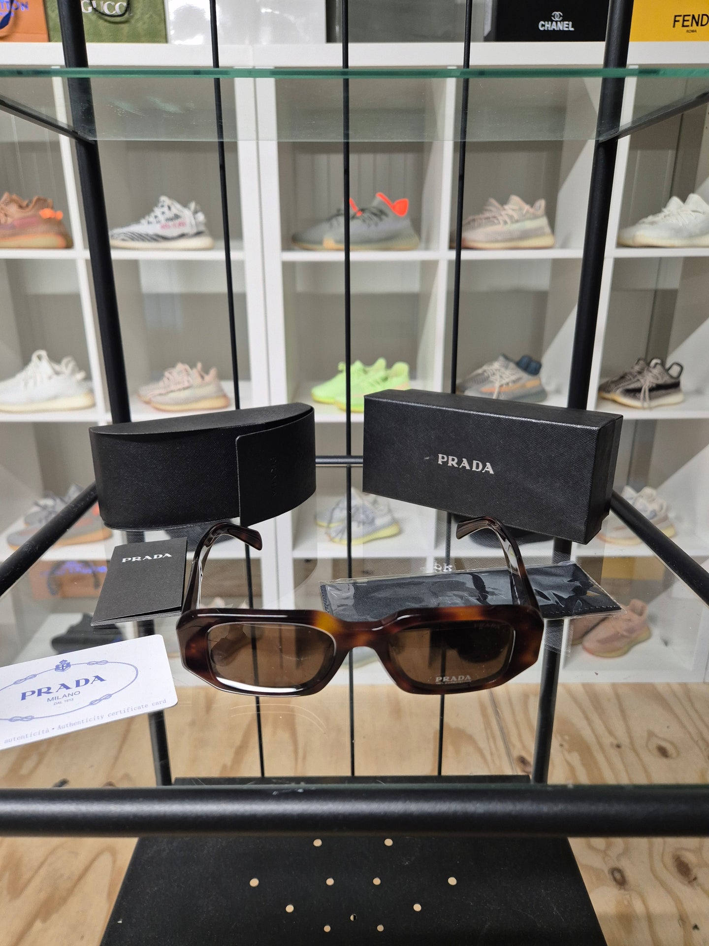DAMES ZONNEBRILLEN PRADA BRUIN